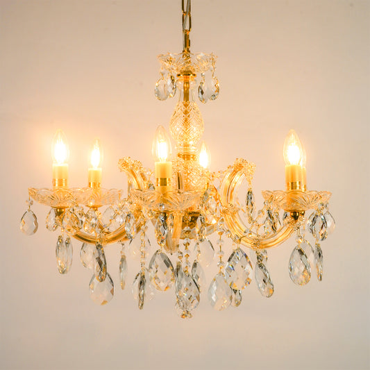 White background image of elegant crystal chandelier for modern living room decor styling with a bright warm glow.