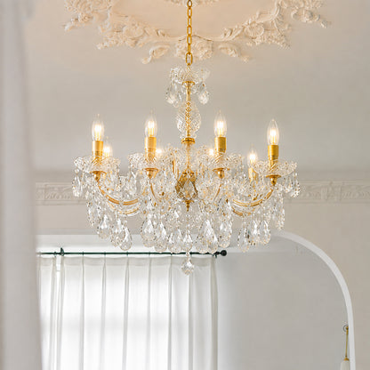 Lifestyle image of eight light candle style chandelier for luxury ceiling decor styling with a modern elegant finish.