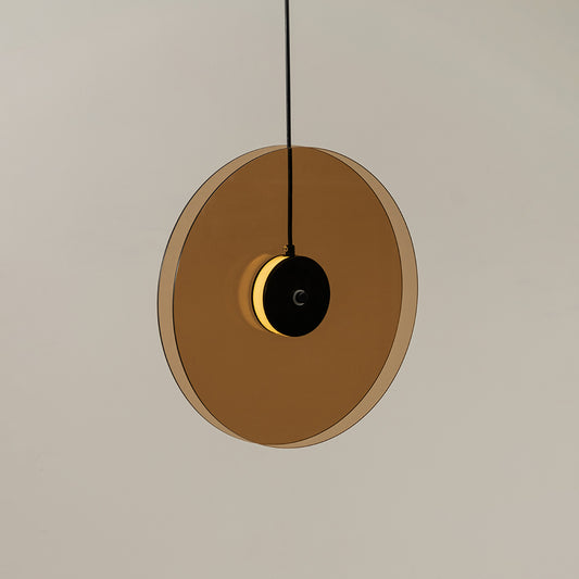 Brown wood and black metal pendant light with disc shade for modern home decor interiors.