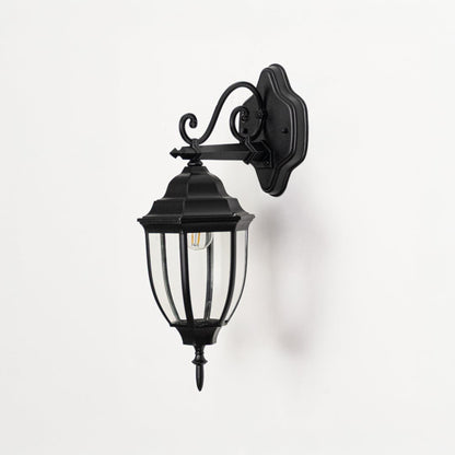 Outdoor wall lantern light off on white background showing black metal construction clear glass panels and vintage inspired wall mount design.