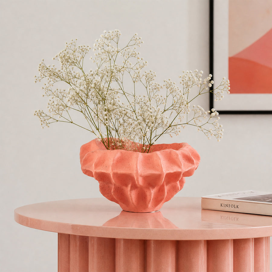 Coral textured ceramic planter bowl with dried flowers placed on table for elegant modern home decor.