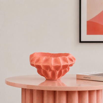 Coral textured ceramic planter bowl with dried flowers placed on table for elegant modern home decor.