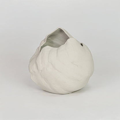 Modern white decorative flower vase isolated clean background stylish ceramic vase for home decor display.