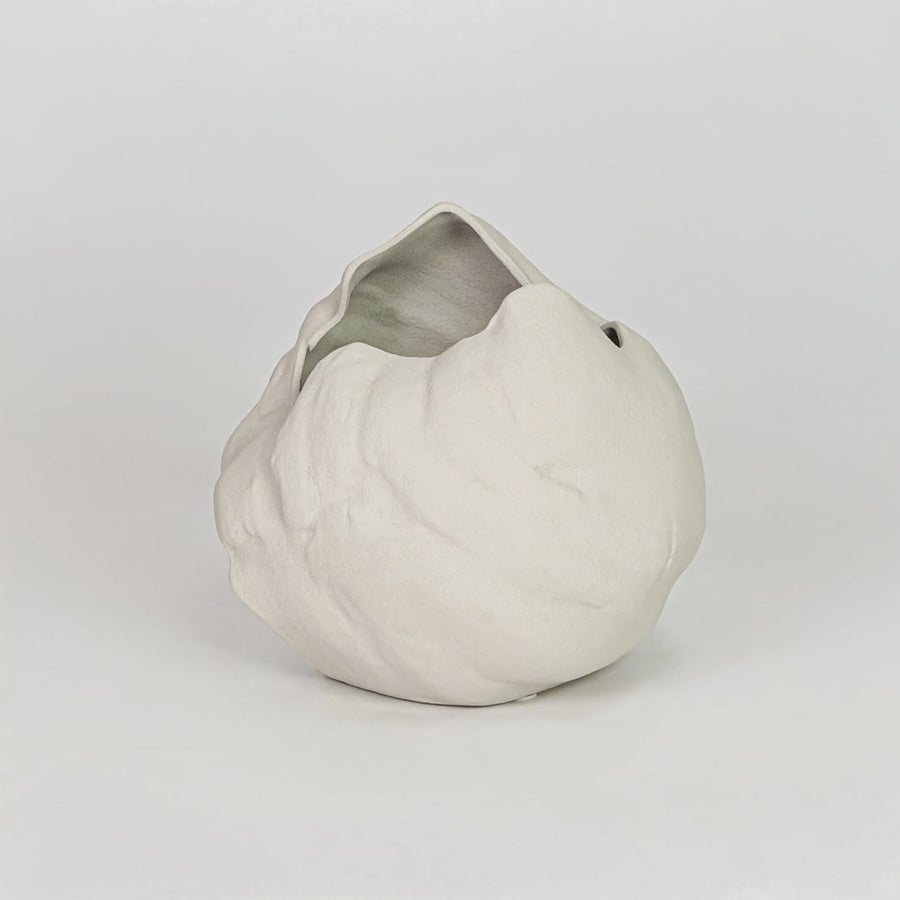 Modern white decorative flower vase isolated clean background stylish ceramic vase for home decor display.