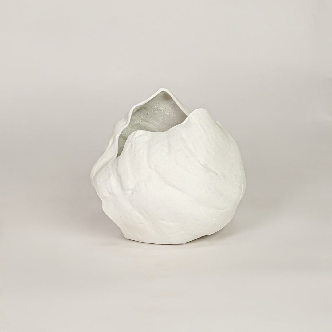vintage cast white ceramic vase white background