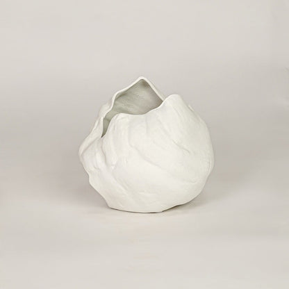 vintage cast white ceramic vase white background