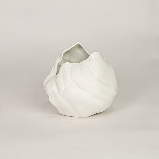 vintage cast white ceramic vase white background