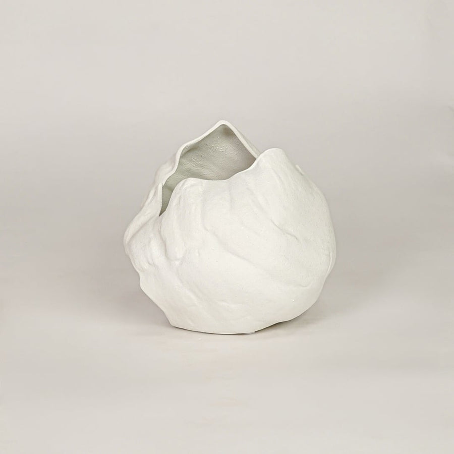 vintage cast white ceramic vase white background