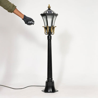 Black metal outdoor lantern post light with classic design for elegant garden pathway lighting decor.