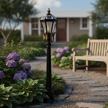 Black metal outdoor lantern post light with glass panels for elegant garden pathway lighting decor.