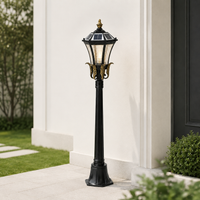 Classic black metal garden lamp post light with gold accents for villa pathway concrete walkway exterior landscape styling.