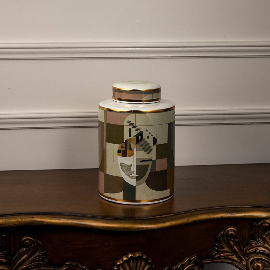 Elegant Abstract Face ceramic jar photographed on a white background showing its cubist-inspired facial design and soft matte finish.