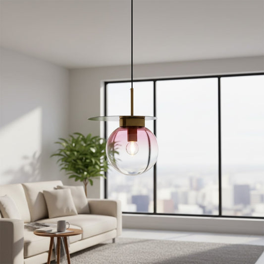 Living room styled with glass pendant light near window adding artistic color accent and airy modern interior Decor ambience.