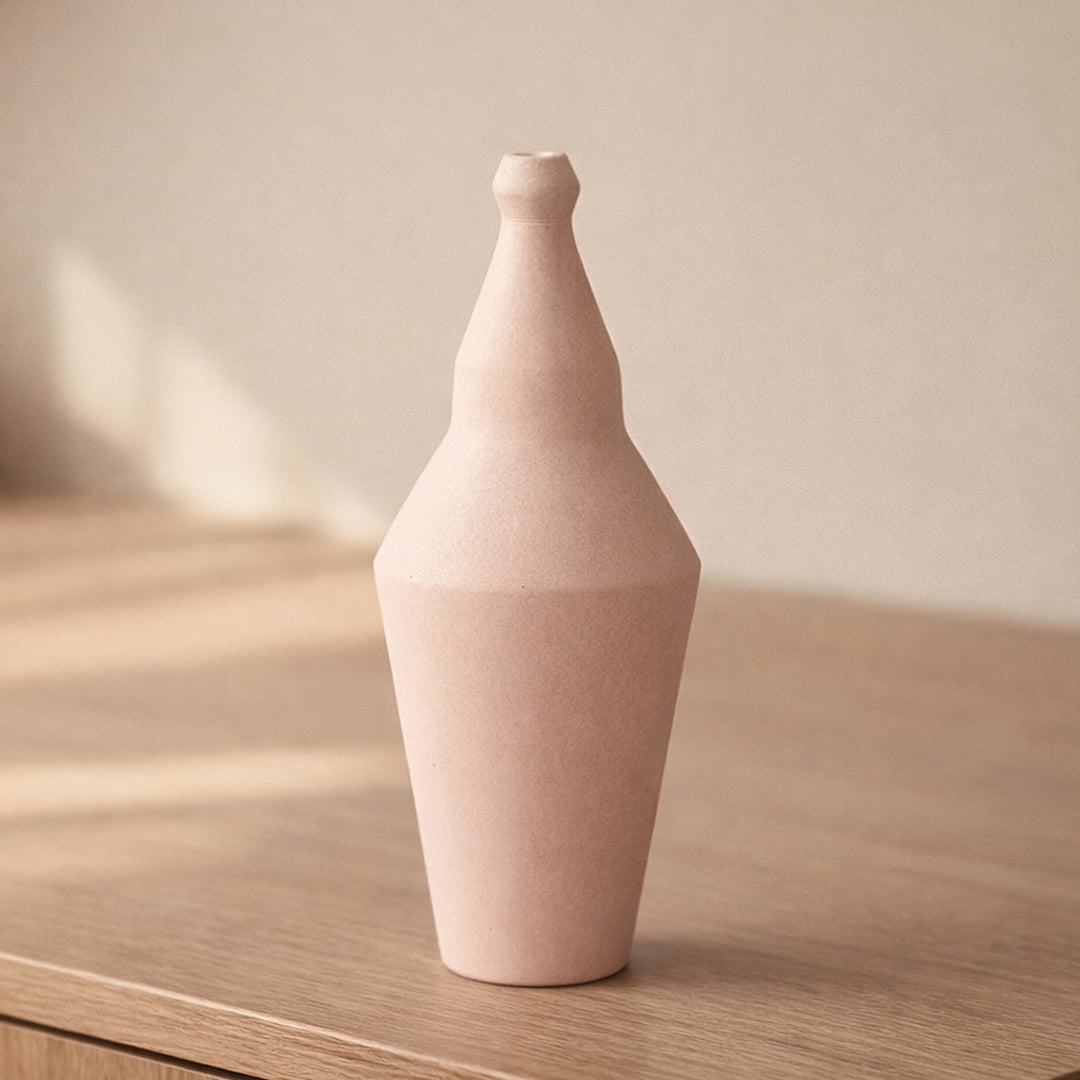 Pink ceramic decorative vase placed on table modern flower vase for living room shelf console home decor styling.