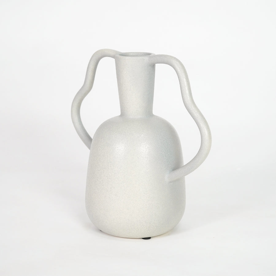 Modern white ceramic vase for elegant coffee table placement and minimalist living room decor styling accent piece.