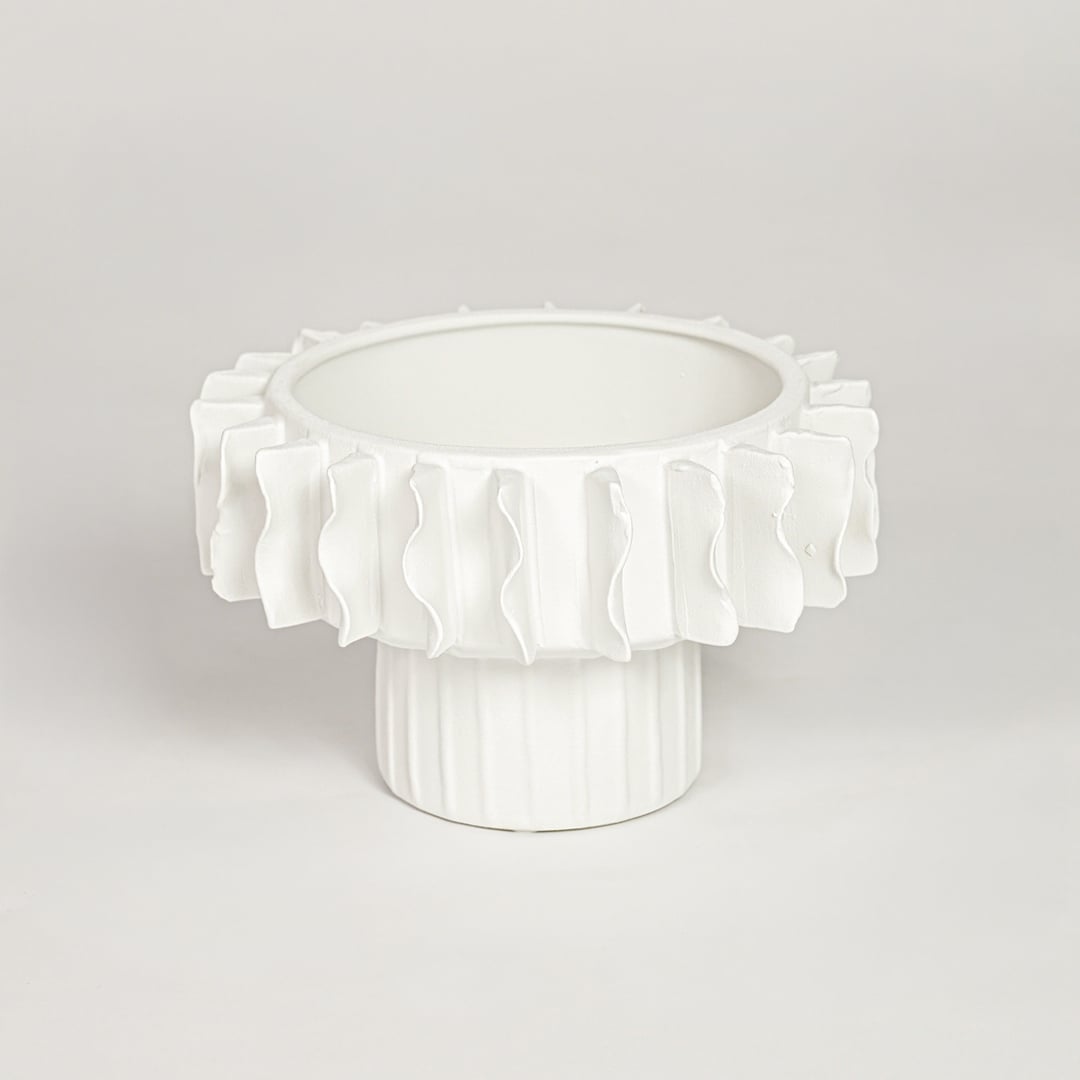 White ceramic frilled small vase with layered sculpted rim isolated on clean white background for elegant decor styling.