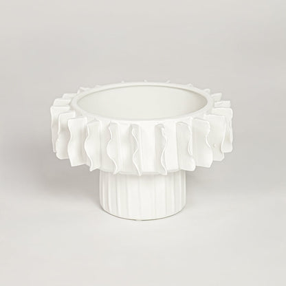 White ceramic frilled small vase with layered sculpted rim isolated on clean white background for elegant decor styling.