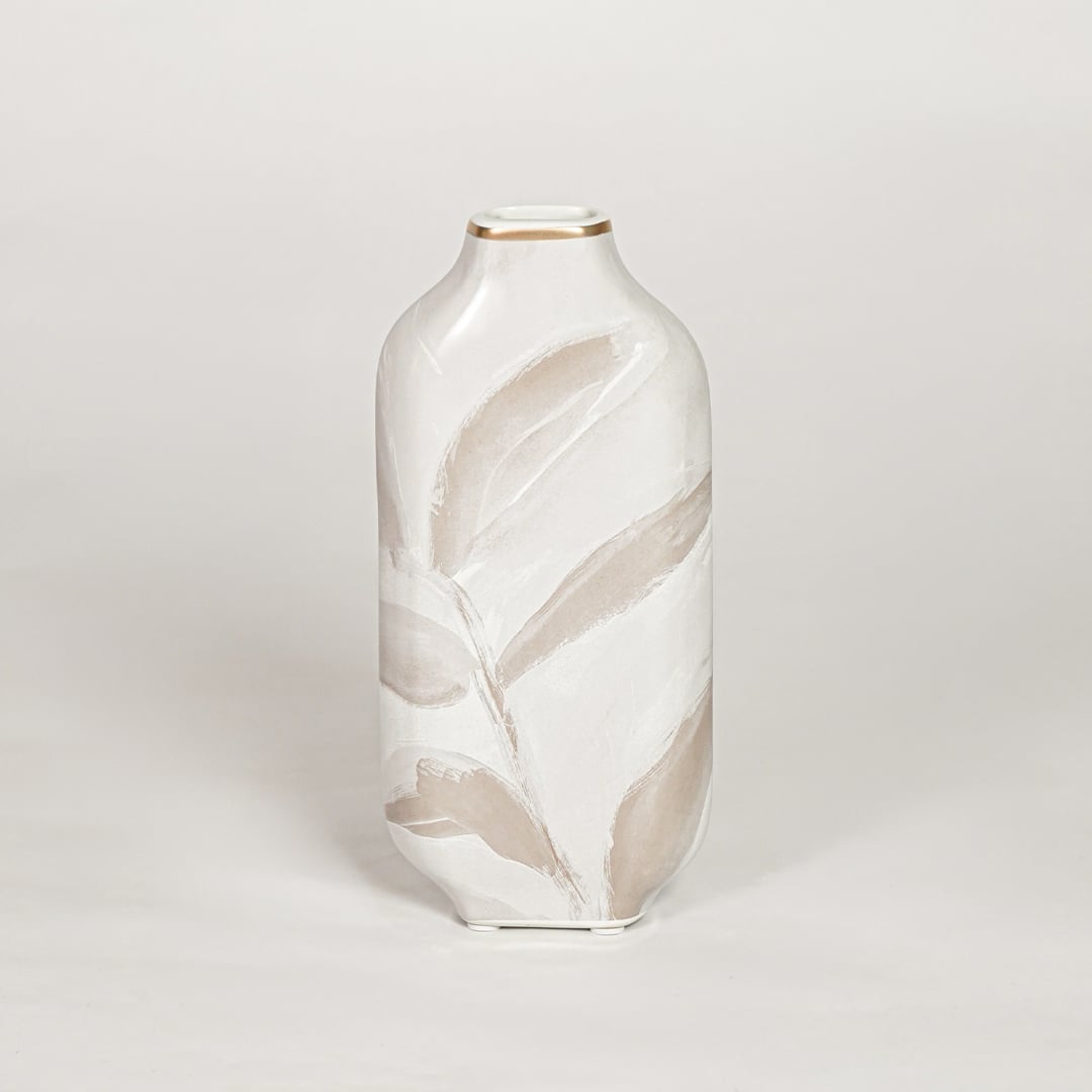 Modern white ceramic decorative vase with beige leaf artwork and gold rim ideal for console table shelf and stylish home decor.