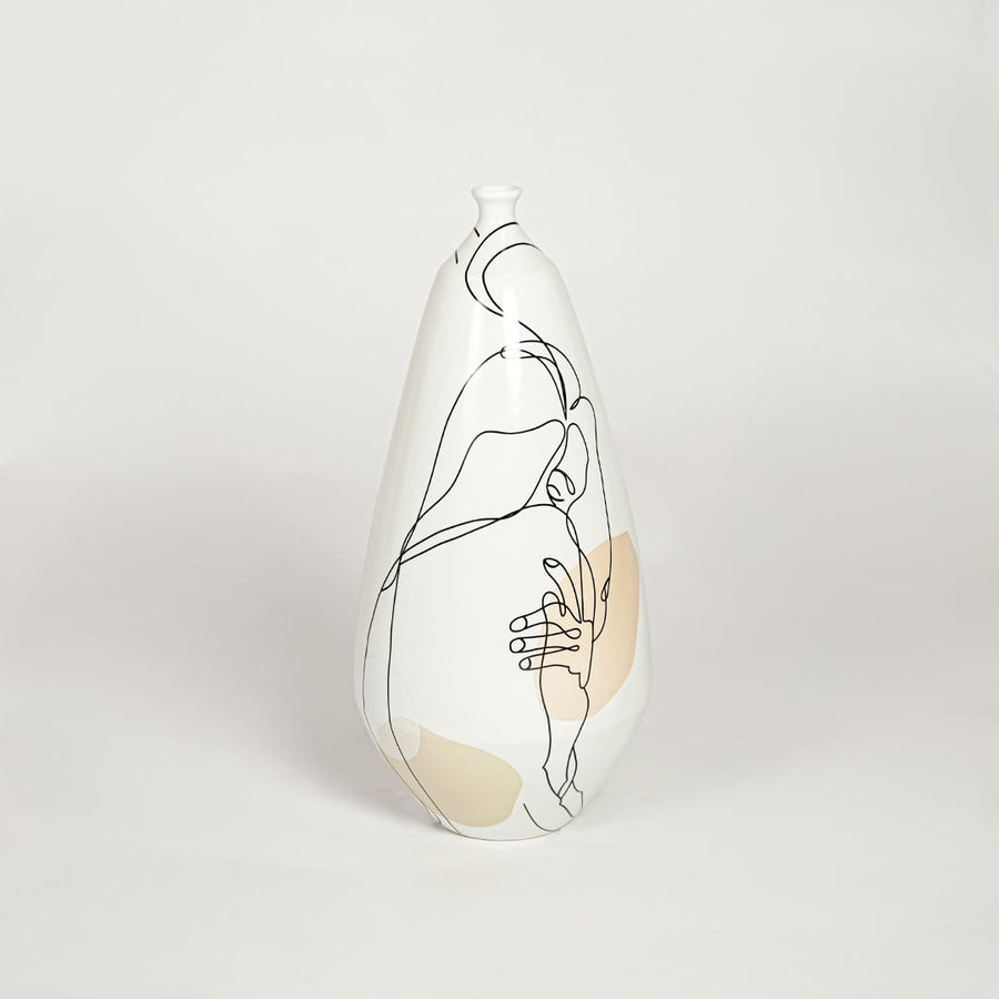 Bottleneck porcelain vase with artistic abstract linear design isolated on clean white background for stylish interior decor.