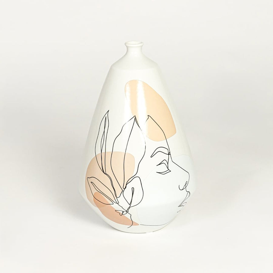 White decorative ceramic art vase on white background modern home decor accent piece for console table styling.