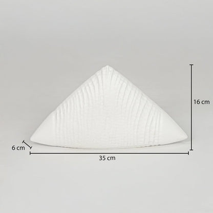 White ceramic decorative showpiece size 6 cm height 30 cm length modern textured decor object dimension reference image.