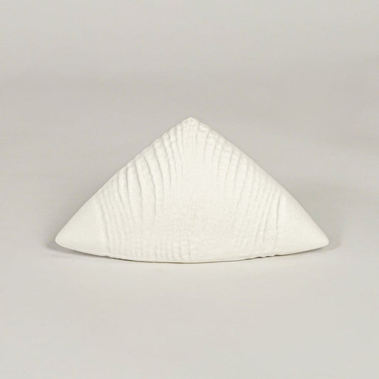 White ceramic abstract decor sculpture with smooth matte texture designed for table shelf or console placement.