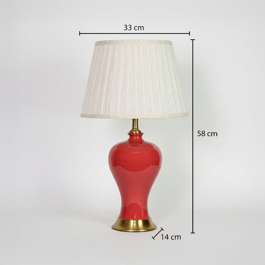Red ceramic table lamp with fabric shade measuring 58 cm height and 33 cm width for elegant traditional interiors.