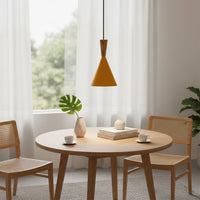Mustard cone pendant light with wood detail enhancing cozy dining spaces with modern elegance.