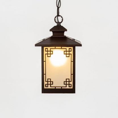 A classic rectangular hanging lantern light turned on displayed against a white background highlighting its frosted glass panels and geometric metal frame with warm illumination.