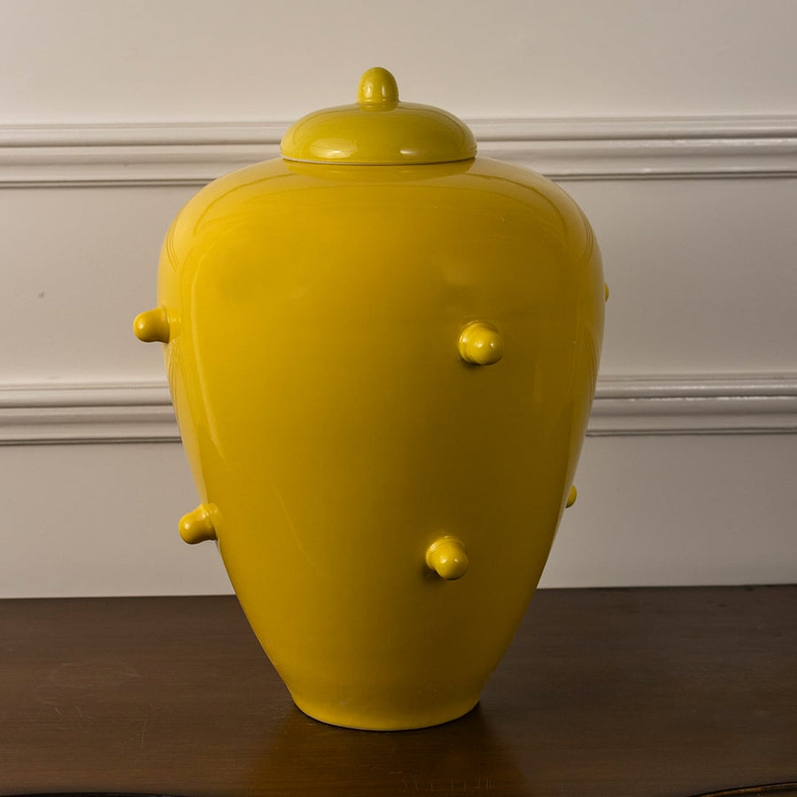 Bright yellow ceramic decorative jar with lid contemporary vase for luxury home decor styling shelf and table placement.