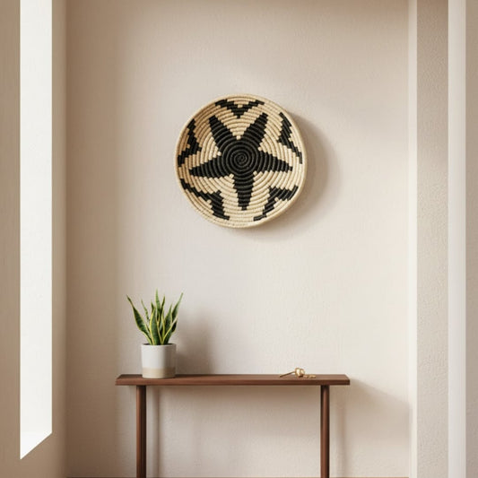 Woven round wall basket styled above slim console table creating natural focal point and calm earthy accent for modern home Decor.