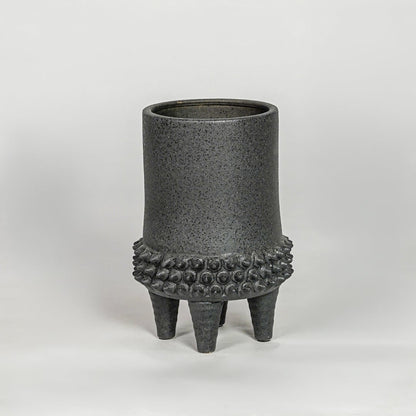 Black ceramic planter vase with textured finish modern decorative pot for tabletop shelf console living room decor styling.
