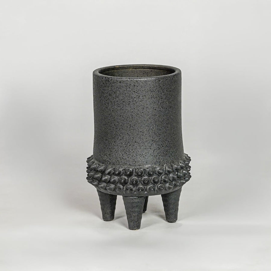 Black ceramic planter vase with textured finish modern decorative pot for tabletop shelf console living room decor styling.