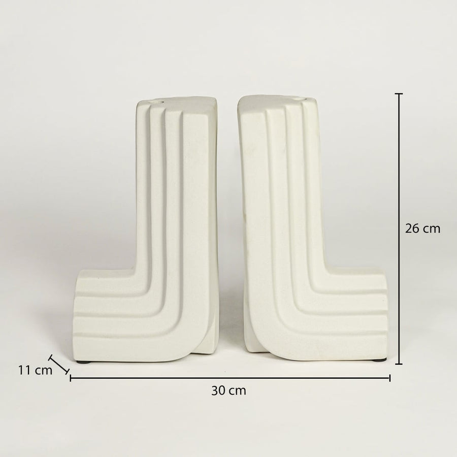 White ceramic sculptural bookends dimension image showing 26 cm height and 30 cm width modern shelf decor set.
