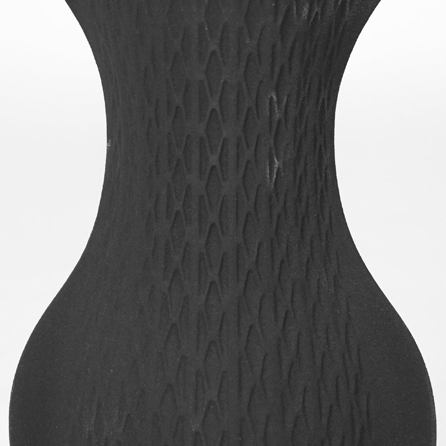 Closeup image of black ceramic textured vase for luxury console table decor styling with elegant matte finish.