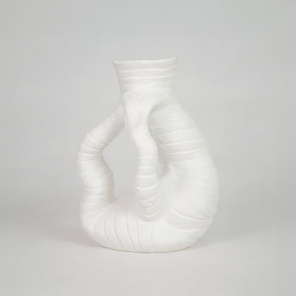 White textured ceramic vase for modern console table placement and elegant indoor home decor styling accent piece.