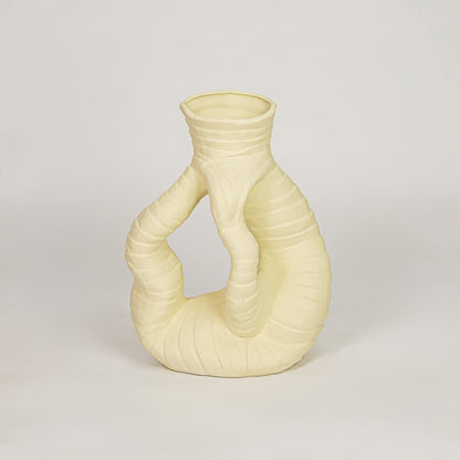 zhu coiled ceramic vase yellow white background