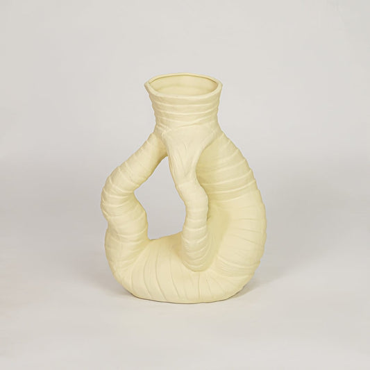 zhu coiled ceramic vase yellow white background