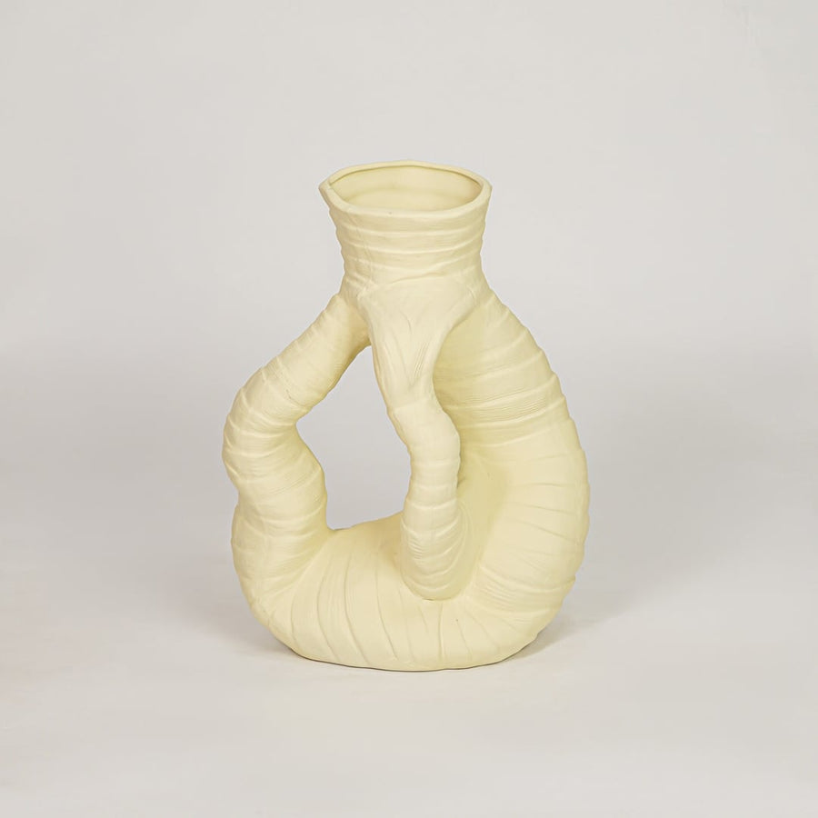 zhu coiled ceramic vase yellow white background