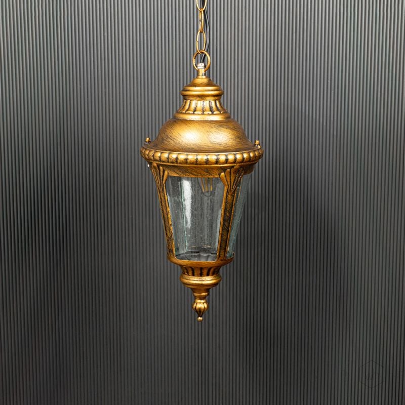 Traditional Outdoor Hanging Lamp Gold Light Off Black Background