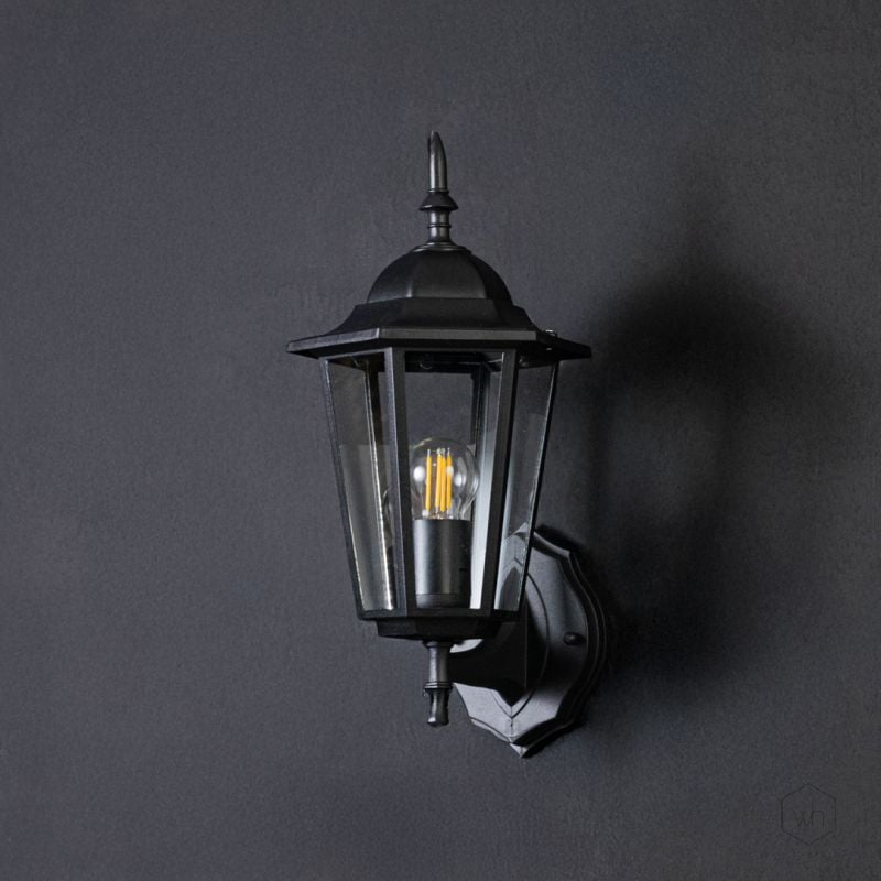 retro outdoor wall light small light off black background
