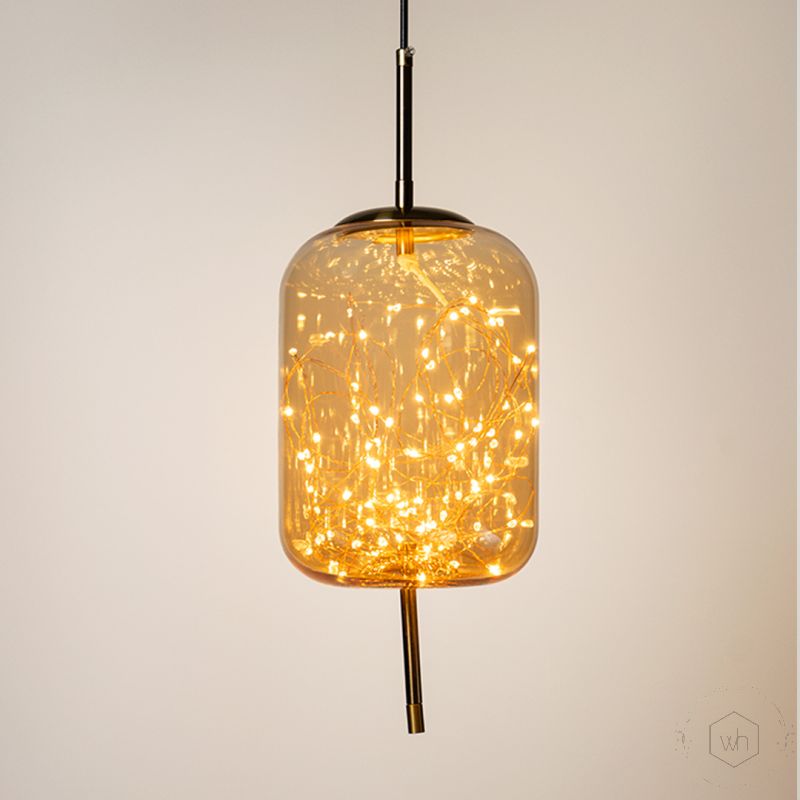 Amber Glass Hanging Lamp Cylinder Light On White Background 1