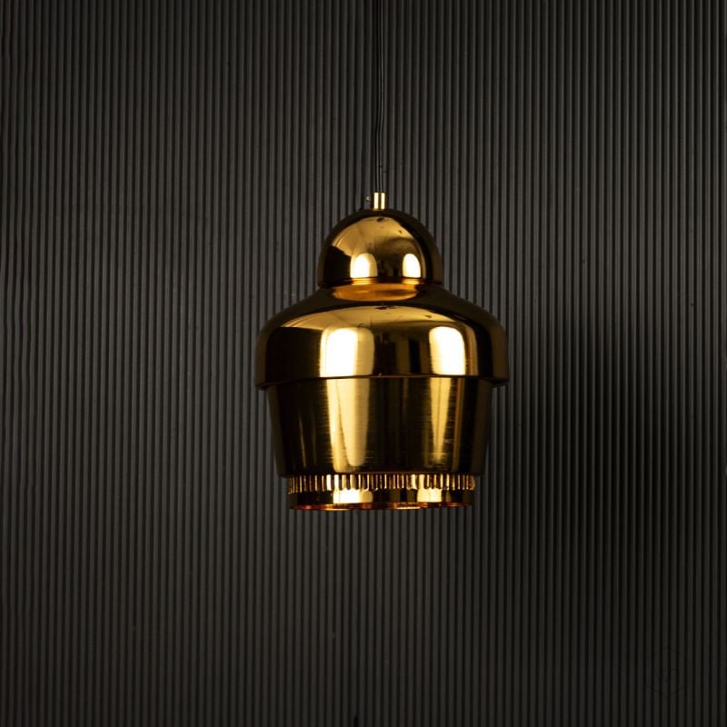 Rodan Pendant Light Gold Light off black background