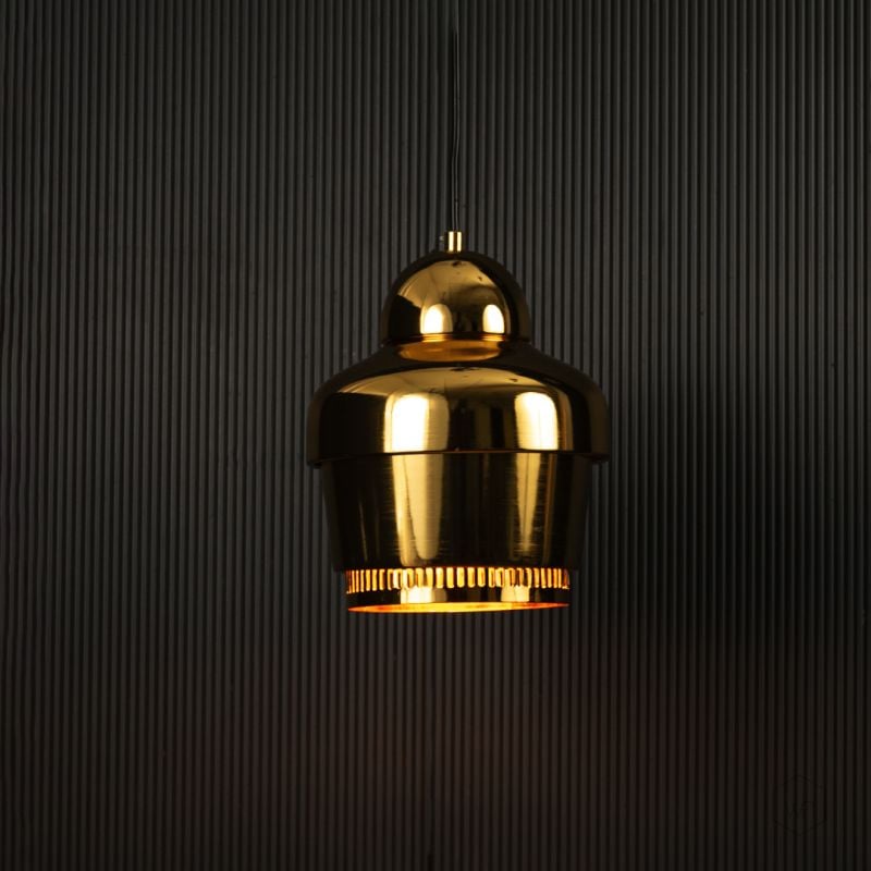 Rodan Pendant Light Gold Light on black background