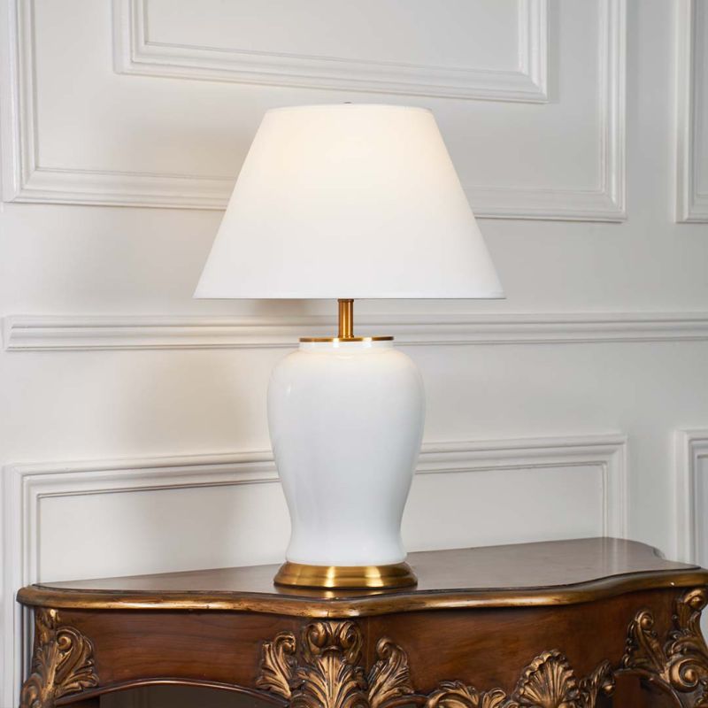 Shiny White Ceramic Table Lamp Light On White Background