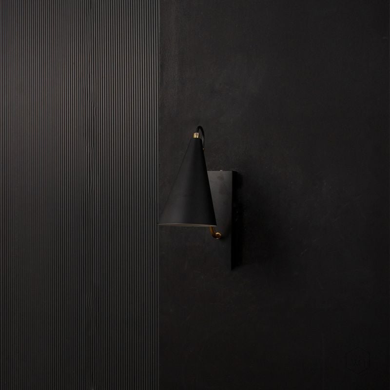 Kalika Modern Wall Sconce Black Light Off Black Background