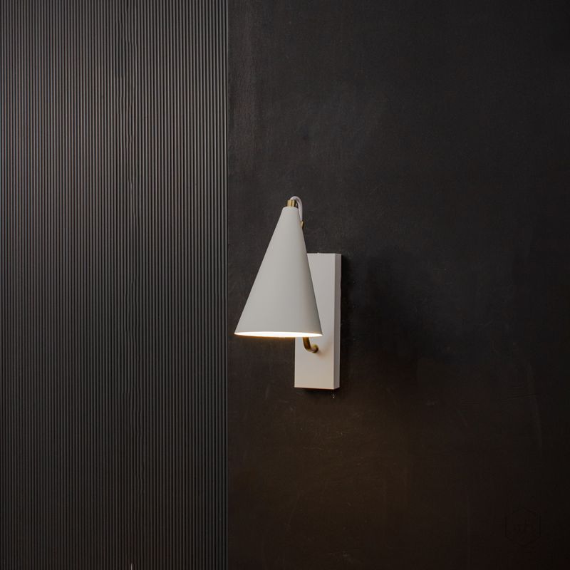 Kalika Modern Wall Sconce White Light On Black Background