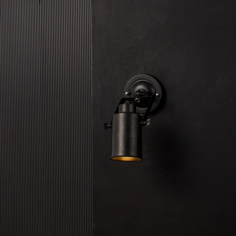 Cylinder Metallic Wall Sconce Black Light On Black Background