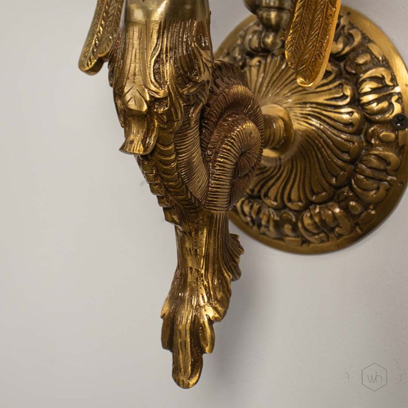 Mermaid cast brass wall sconce Closeup