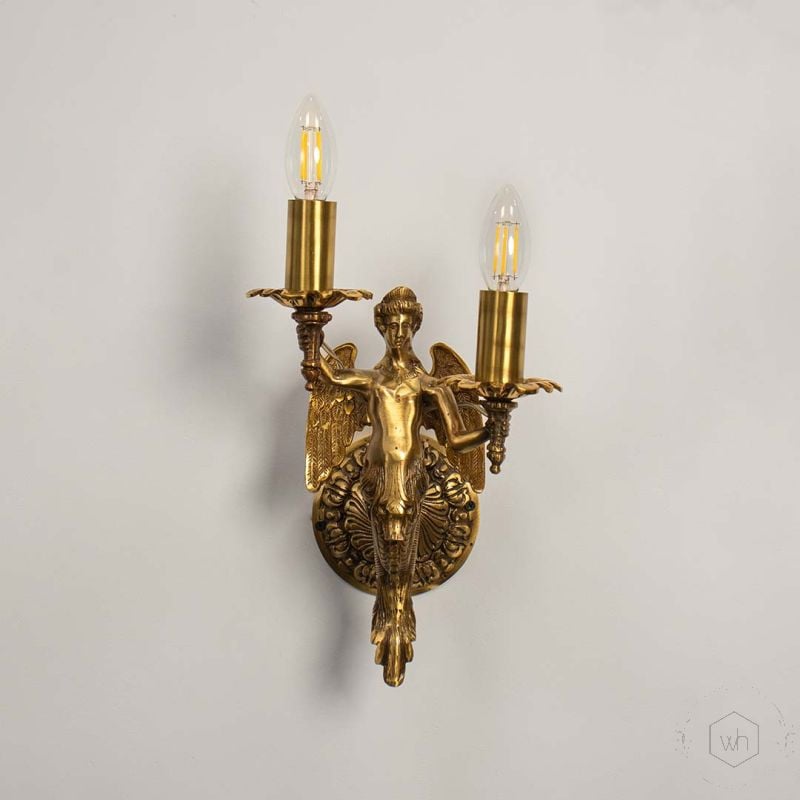 Mermaid cast brass wall sconce Light On White Background